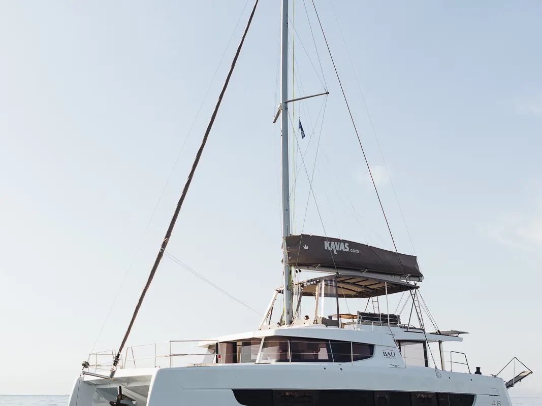 Exterior view of Bali 4.8 - 6 cab., a catamaran at Agios Stefanos, Greece