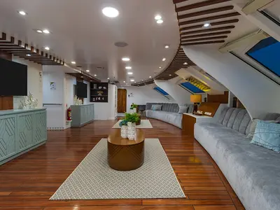 Salon of Gulet Power Catamaran, a catamaran at Parroquia Puerto Baquerizo Moreno, Ecuador