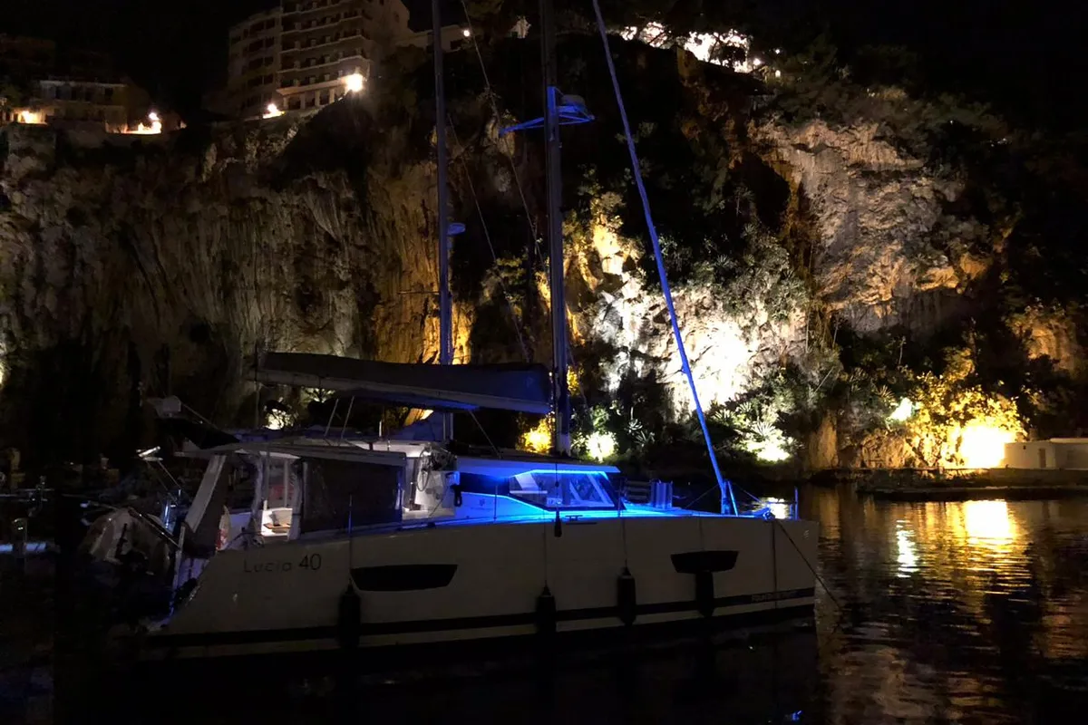 Exterior view of Papaya, a Fountaine Pajot Lucia 40 catamaran at Ibiza, Spain