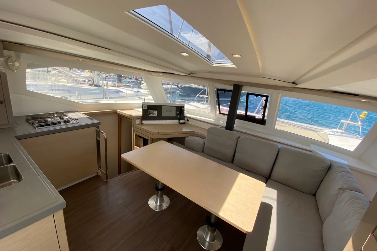 Salon of Papaya, a Fountaine Pajot Lucia 40 catamaran at Ibiza, Spain