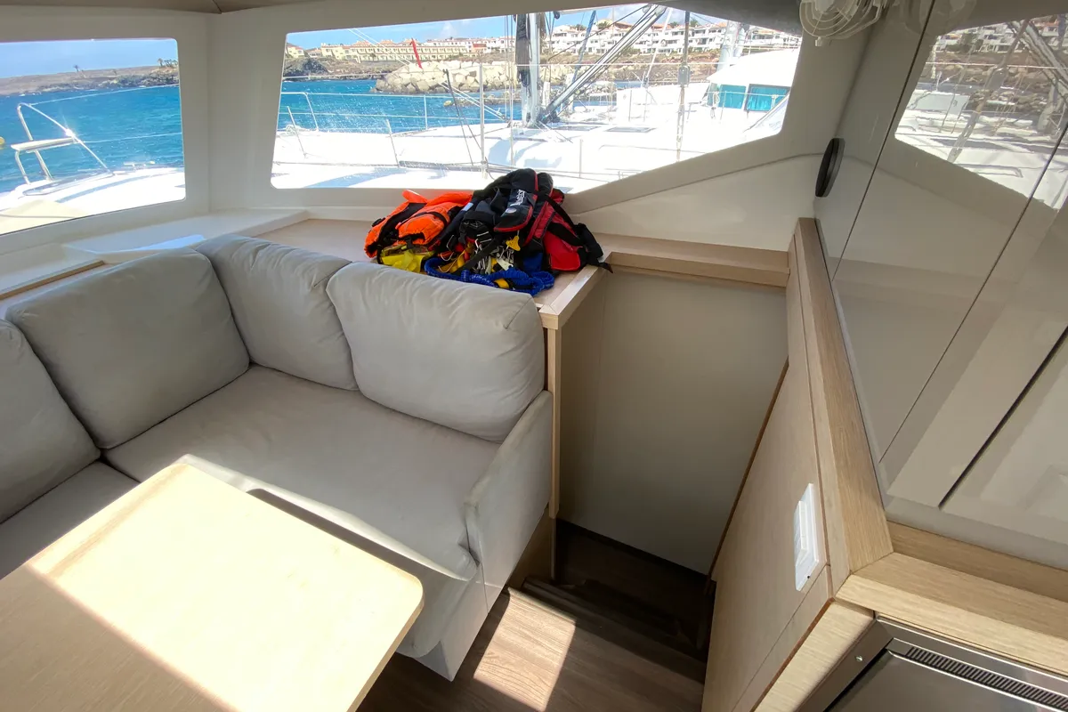 Salon of Papaya, a Fountaine Pajot Lucia 40 catamaran at Ibiza, Spain