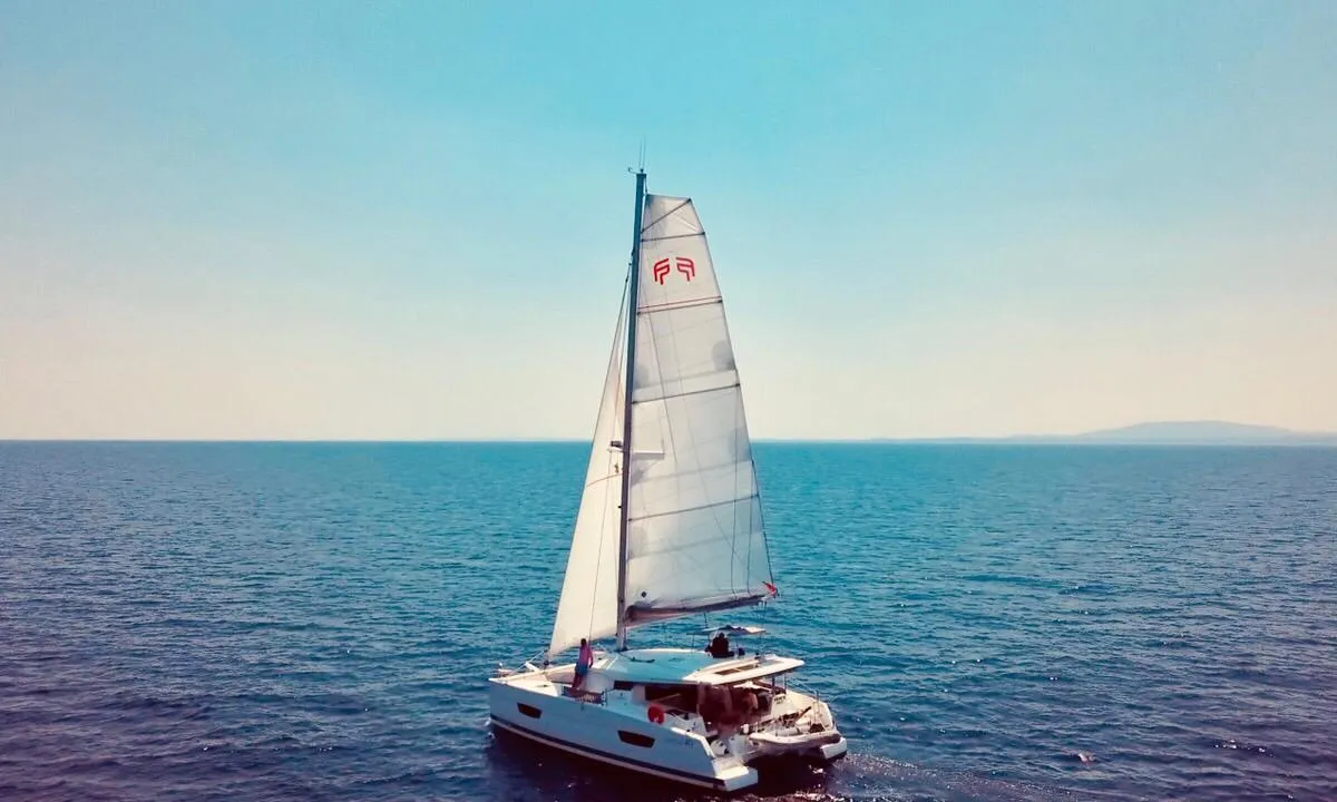 Exterior view of Papaya, a Fountaine Pajot Lucia 40 catamaran at Ibiza, Spain