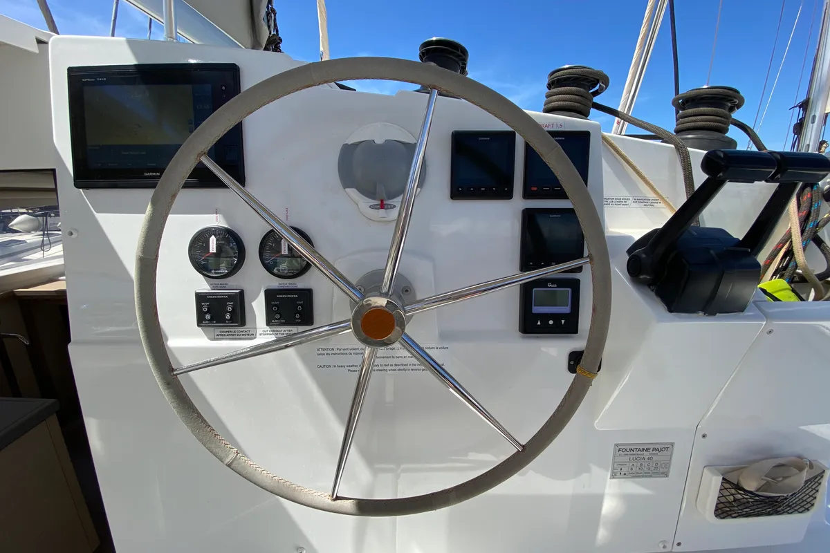 Cockpit of Papaya, a Fountaine Pajot Lucia 40 catamaran at Ibiza, Spain