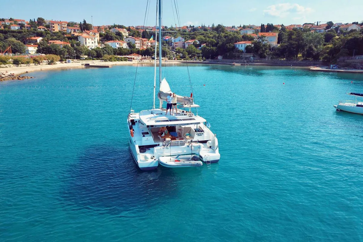 Exterior view of Papaya, a Fountaine Pajot Lucia 40 catamaran at Ibiza, Spain
