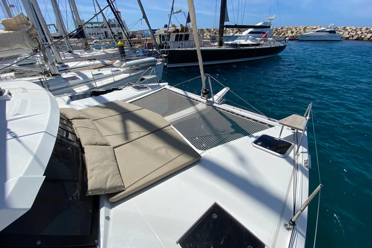 Exterior view of Papaya, a Fountaine Pajot Lucia 40 catamaran at Ibiza, Spain