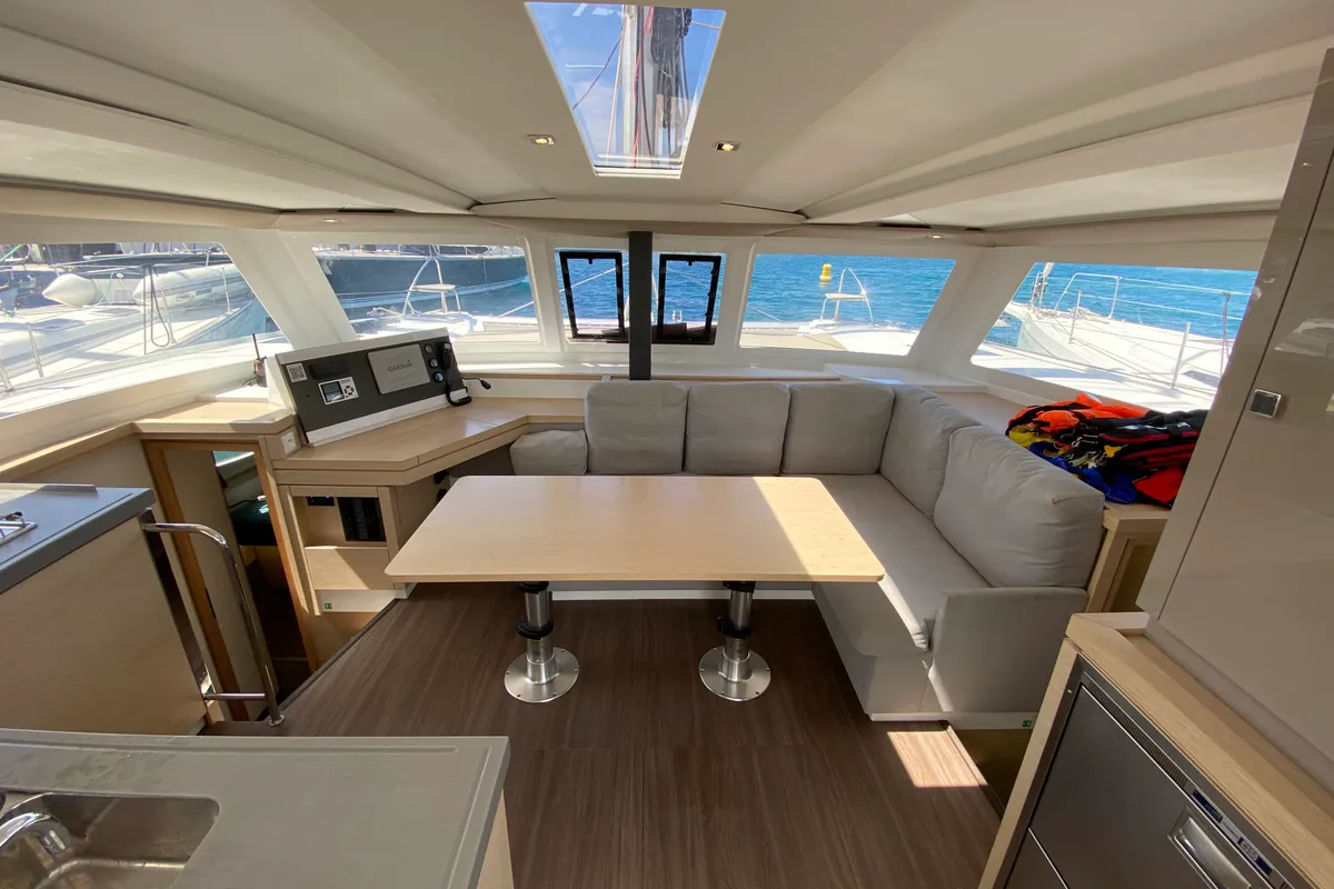Salon of Papaya, a Fountaine Pajot Lucia 40 catamaran at Ibiza, Spain