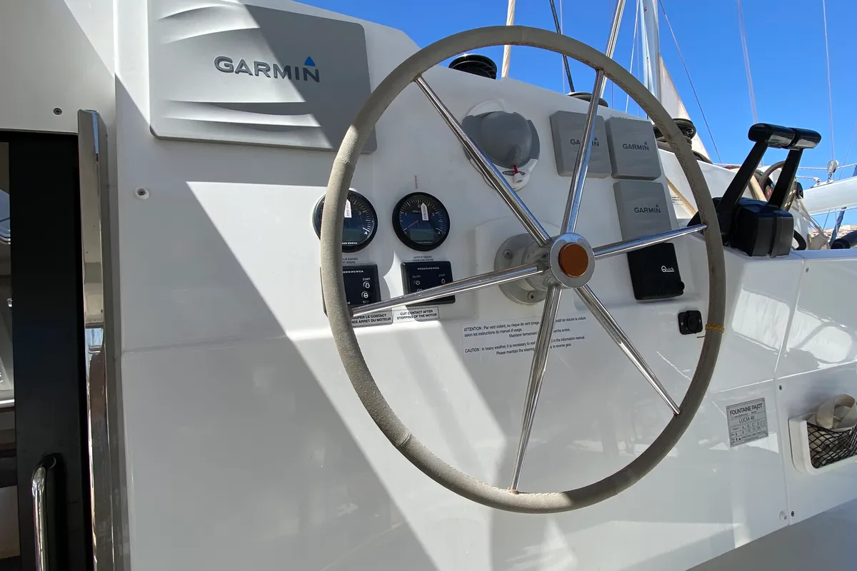 Cockpit of Papaya, a Fountaine Pajot Lucia 40 catamaran at Ibiza, Spain