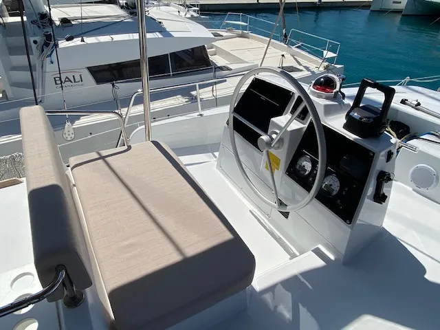 Cockpit of Mira, a Bali 4.6 catamaran at Olbia, Italy