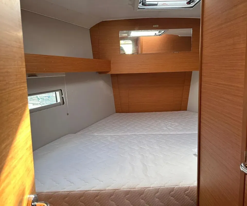 Cabin on Nagini, a Dufour 390 sailboat at Procida, Italy