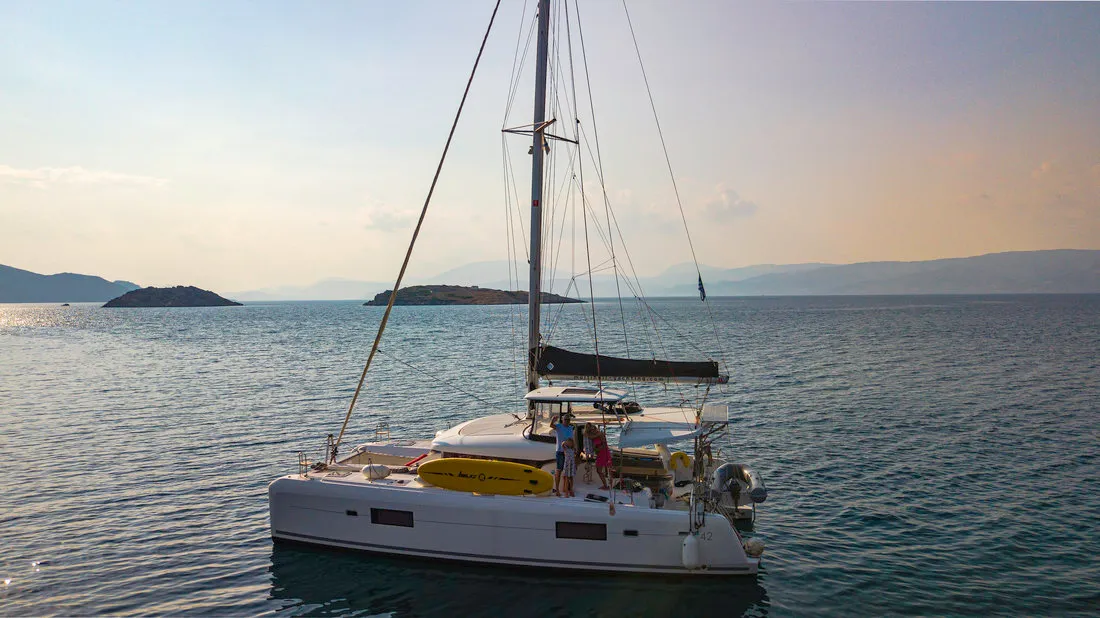 Exterior view of Chamotte, a Lagoon 42 catamaran at Lavrion, Greece