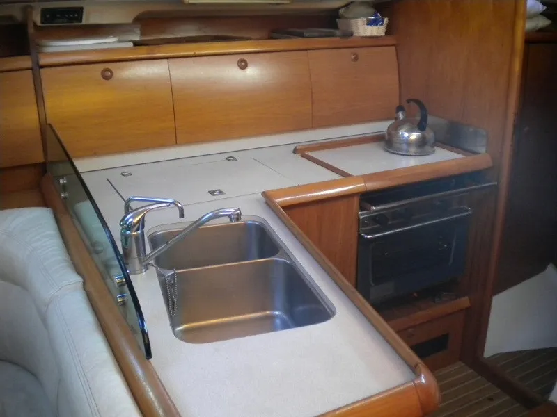 Exterior view of Panic, a Jeanneau Sun Odyssey 40 sailboat at Athens, Marina Delta Kallithea, Greece
