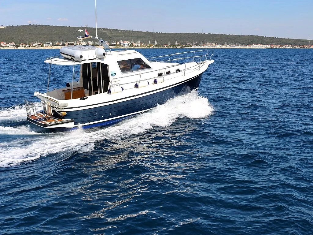 Exterior view of Vella, a SAS - Vektor Adria 1002 Vektor motorboat at Sukošan, Croatia