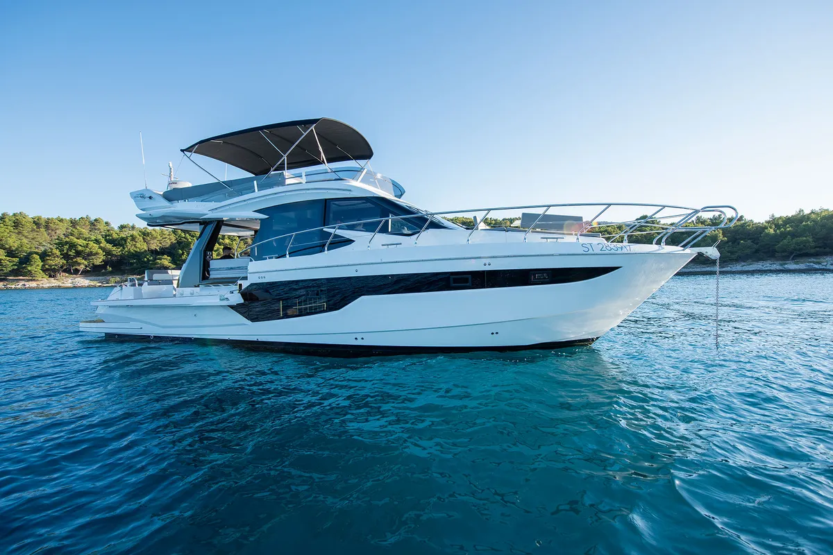 Exterior view of Champ Atlantis, a Galeon 500 Fly motor yacht at Grad Kaštela, Croatia