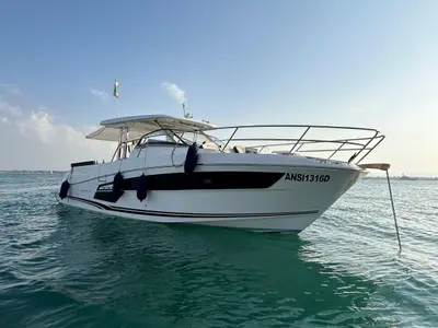 Exterior view of Ansimaste, a Jeanneau Cap Camarat 12.5 motorboat at Syracuse, Italy