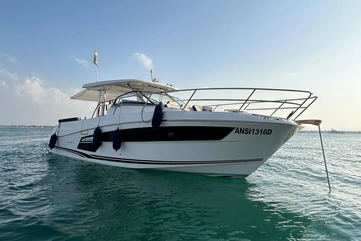 Exterior view of Ansimaste, a Jeanneau Cap Camarat 12.5 motorboat at Syracuse, Italy