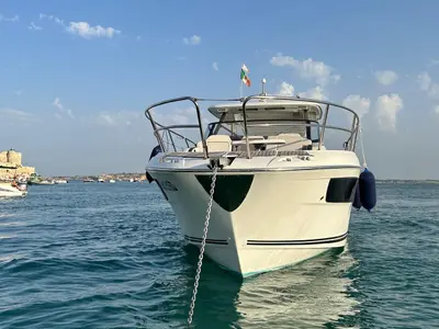 Exterior view of Ansimaste, a Jeanneau Cap Camarat 12.5 motorboat at Syracuse, Italy