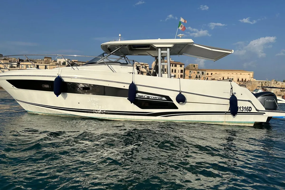 Exterior view of Ansimaste, a Jeanneau Cap Camarat 12.5 motorboat at Syracuse, Italy