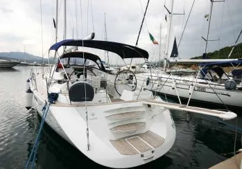 Exterior view of Cassiopea II, a Jeanneau Sun Odyssey 54DS sailboat at Olbia, Italy