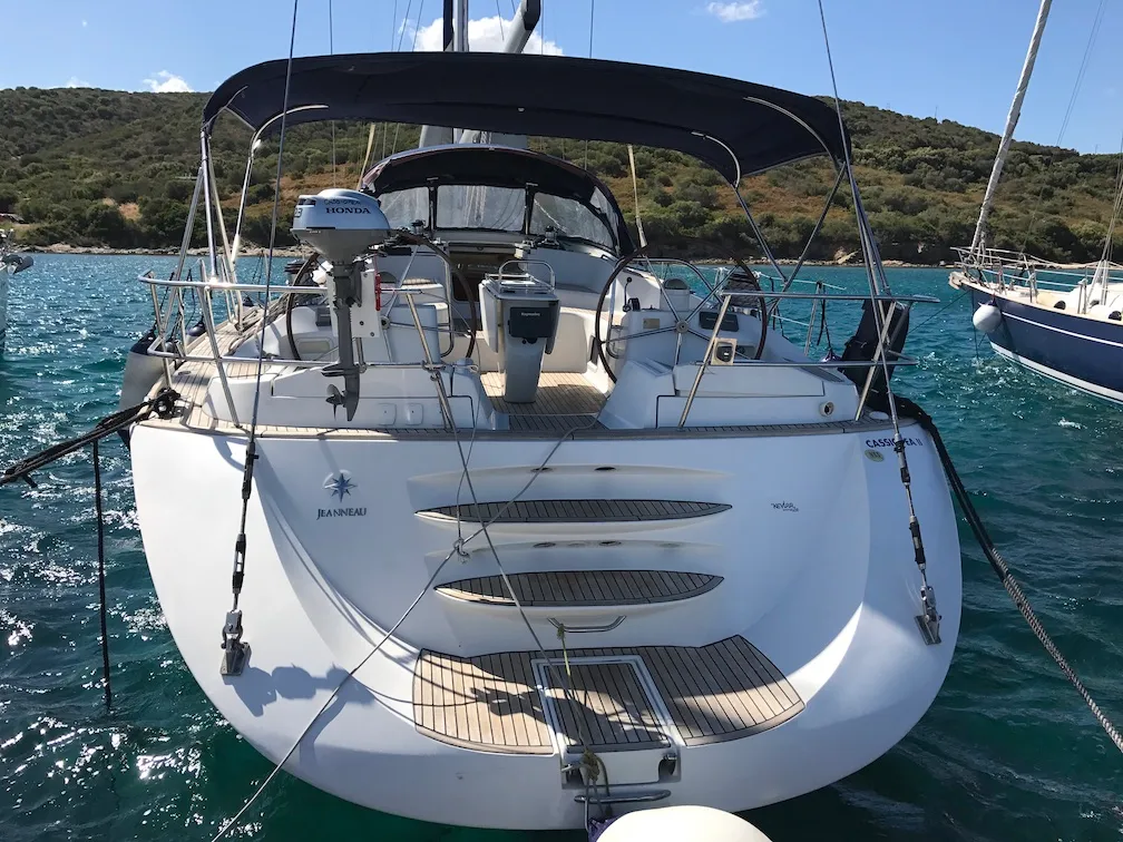 Exterior view of Cassiopea II, a Jeanneau Sun Odyssey 54DS sailboat at Olbia, Italy