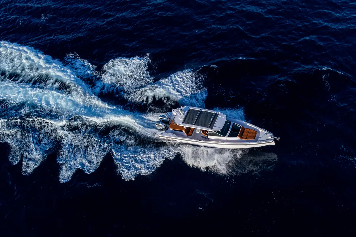 Exterior view of Axe, a Axopar 37 Sun Top motorboat at Grad Vodice, Croatia