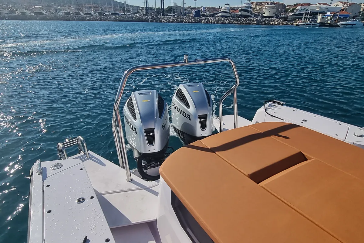 Axe, a Axopar 37  Sun Top motorboat at Grad Vodice, Croatia