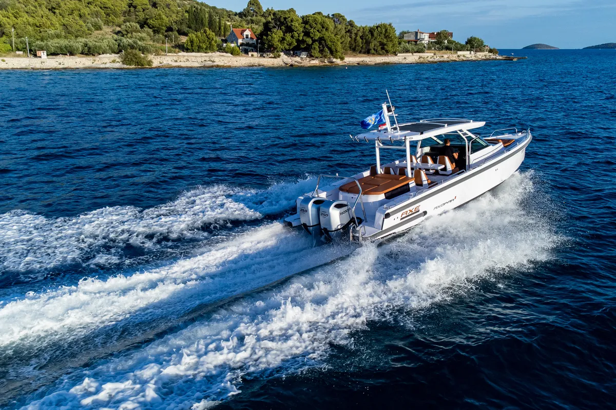 Exterior view of Axe, a Axopar 37 Sun Top motorboat at Grad Vodice, Croatia