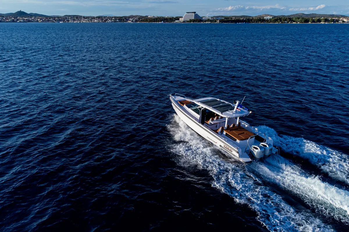Exterior view of Axe, a Axopar 37 Sun Top motorboat at Grad Vodice, Croatia