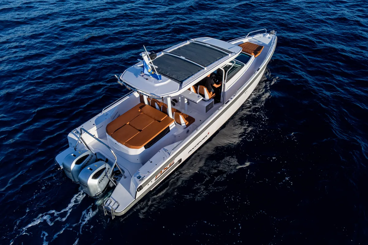 Exterior view of Axe, a Axopar 37  Sun Top motorboat at Grad Vodice, Croatia
