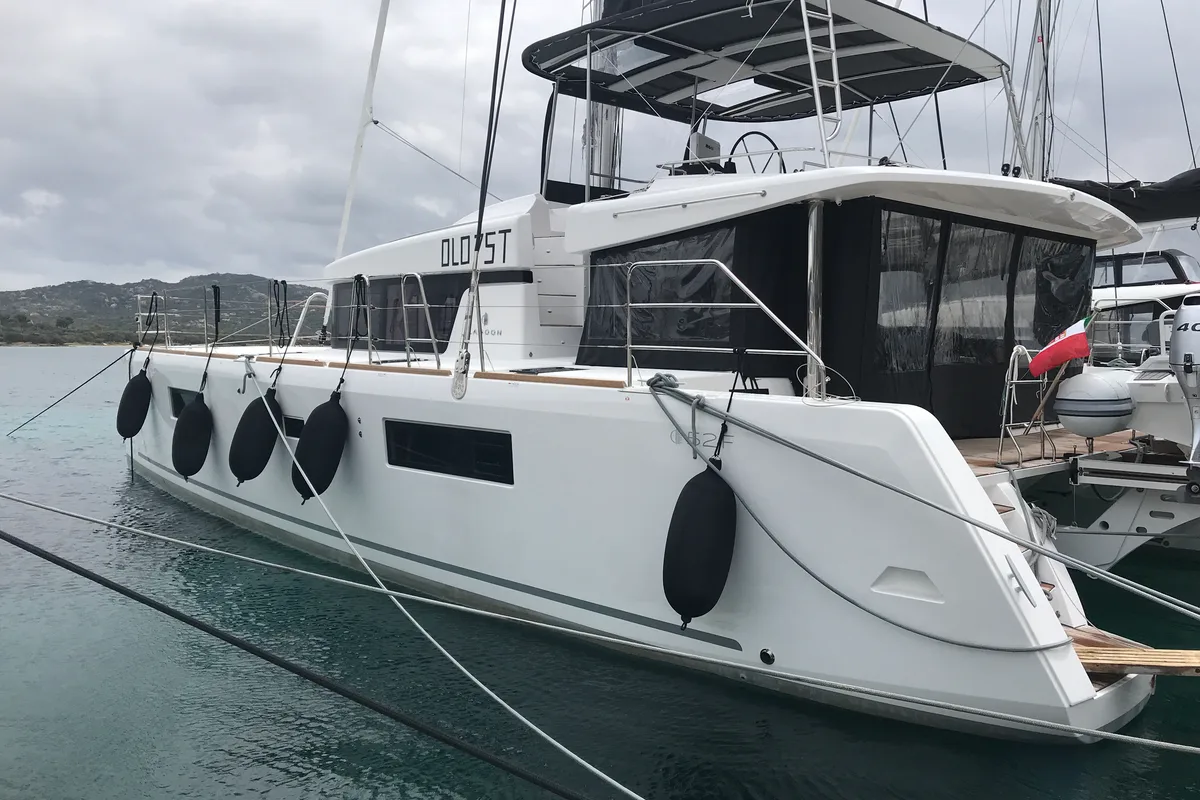 Exterior view of Dugongo II, a Lagoon 52 catamaran at Olbia, Italy
