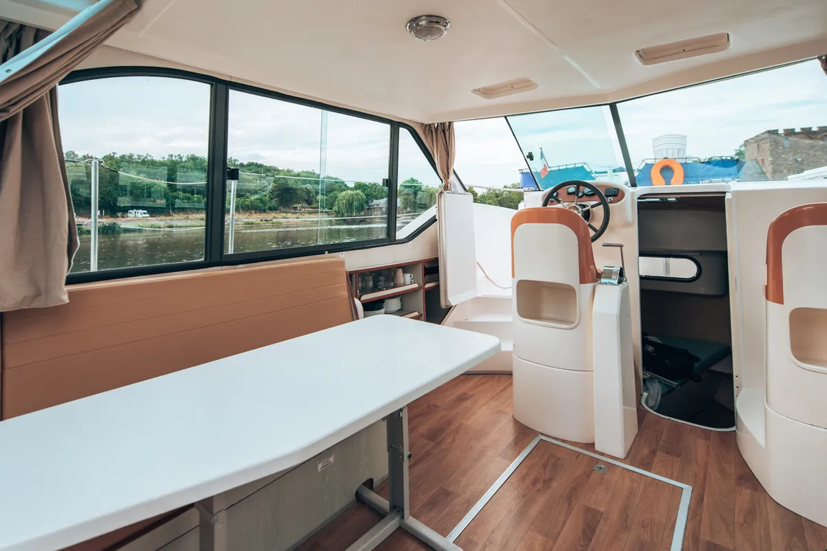 Cockpit of Allegro II, a Nicols Confort 900 DP motorboat at Grez-Neuville, France