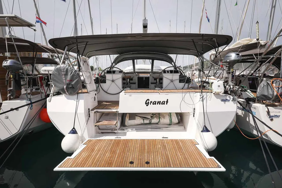 Exterior view of Granat, a Bavaria C50 Holiday sailboat at Grad Trogir, Croatia