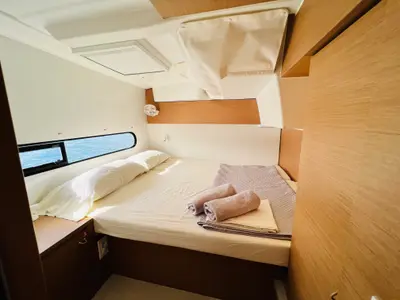 Cabin on Moana Mallorca Crewed, a Excess 11 catamaran at Port d'Andratx, Spain