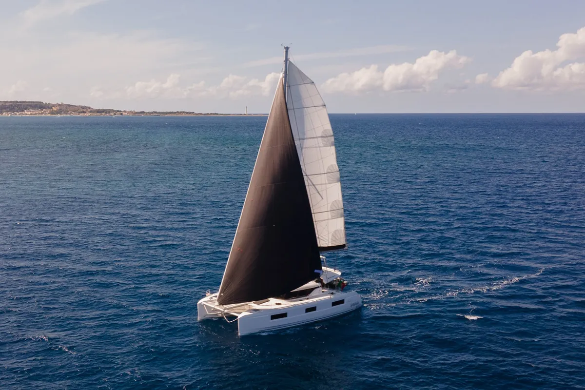 Exterior view of Sabari, a Lagoon 46 catamaran at Olbia, Italy