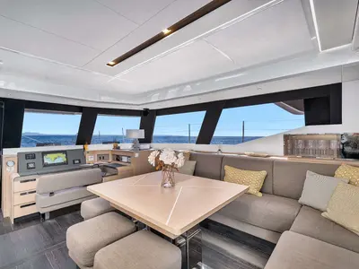 Salon of NEOW, a Fountaine Pajot Alegria 67 catamaran at Cannes, France