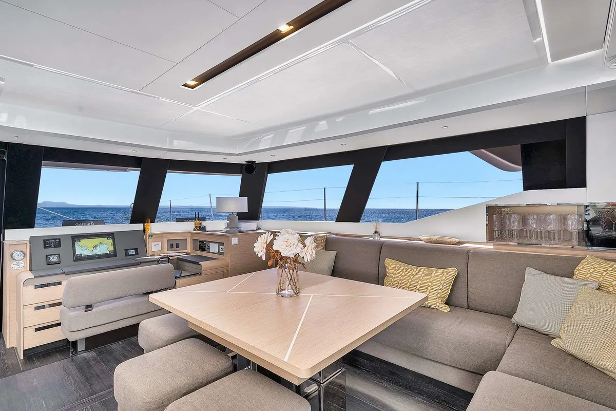 Salon of NEOW, a Fountaine Pajot Alegria 67 catamaran at Cannes, France