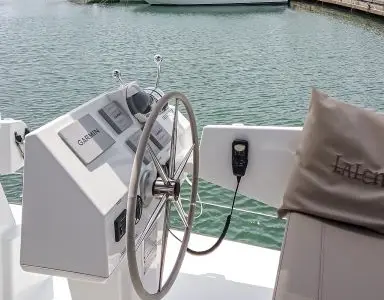 Cockpit of Lalena, a Fountaine Pajot Astréa 42 catamaran at Castellammare di Stabia, Italy