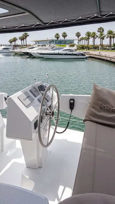 Cockpit of Lalena, a Fountaine Pajot Astréa 42 catamaran at Castellammare di Stabia, Italy