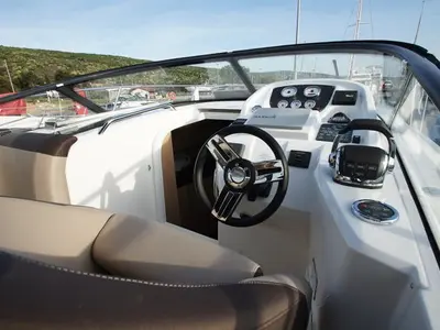 Cockpit of Vjeko, a Bavaria S29 motorboat at Punat, Croatia