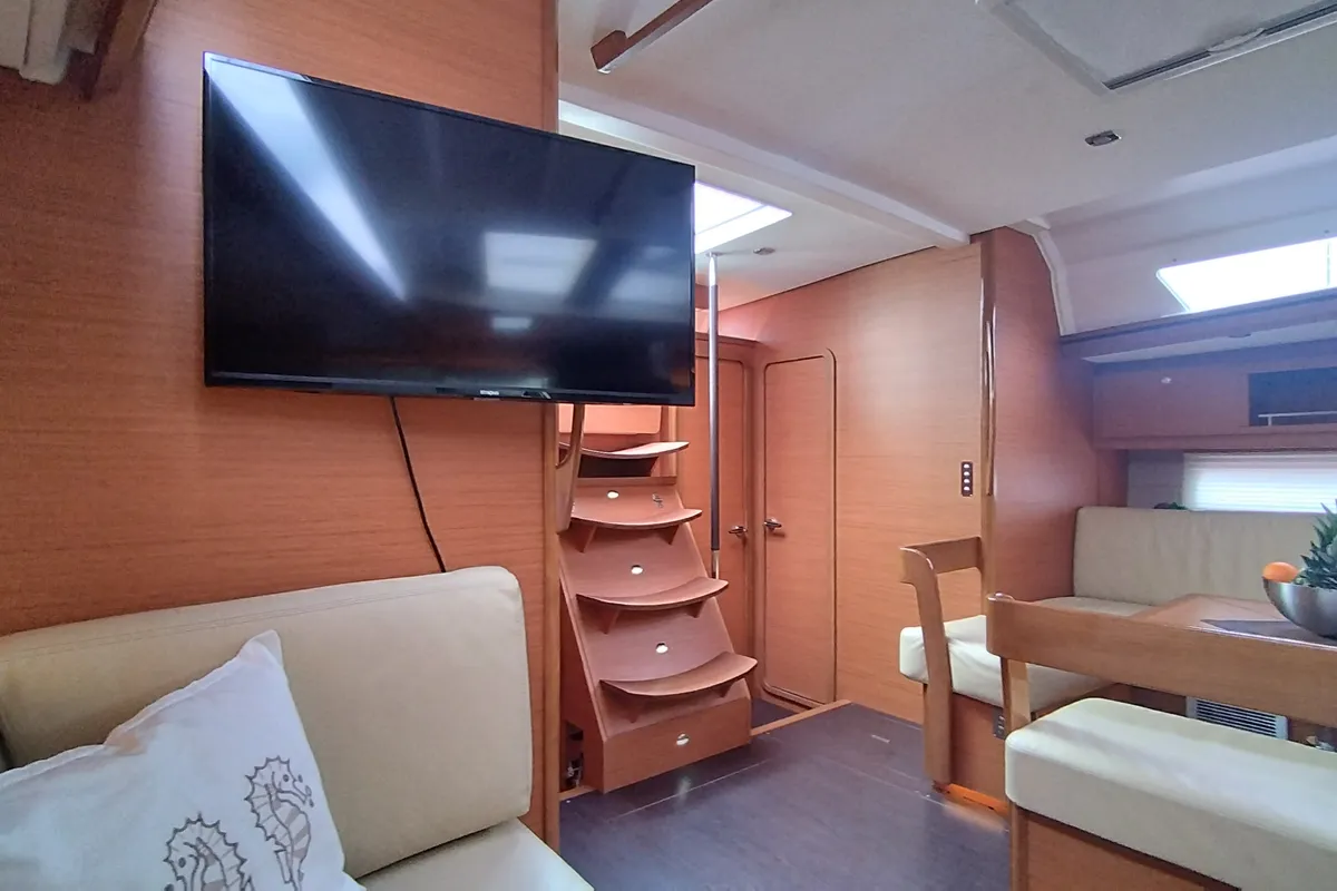 Salon of Morisia, a Dufour 56 Exclusive sailboat at Olbia, Italy