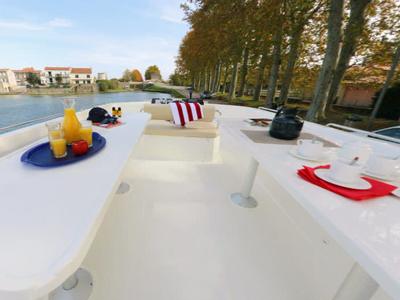 Deck of Cygnet Vision 4, a motorboat at Le Mas-d'Agenais, France