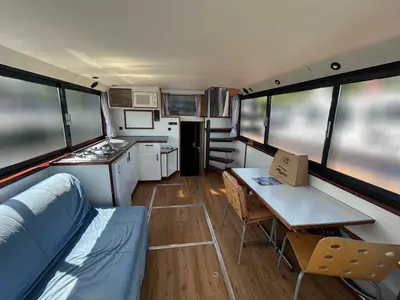 Salon of De Drait Safari Houseboat 1050, a motorboat at Drachten, Netherlands