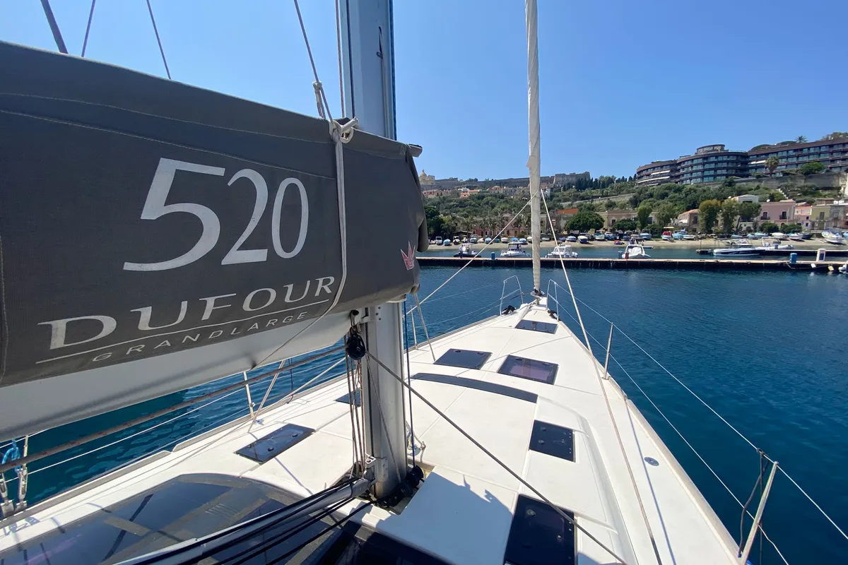 Exterior view of Moscow Mule, a Dufour 520 GL sailboat at Milazzo, Italy