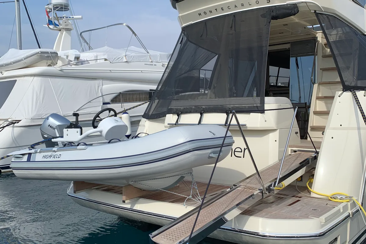 Exterior view of Sundowner, a Beneteau Monte Carlo 5 motorboat at Grad Trogir, Croatia