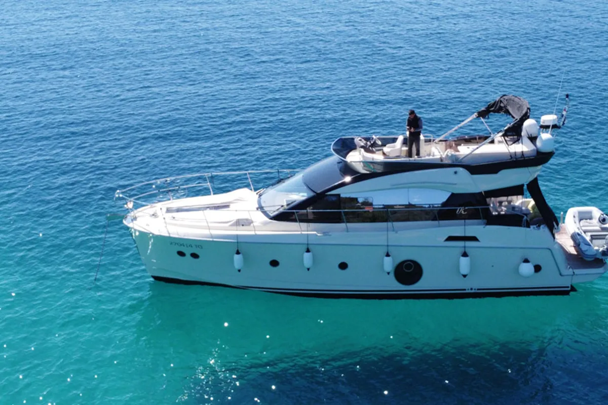 Exterior view of Sundowner, a Beneteau Monte Carlo 5 motorboat at Grad Trogir, Croatia