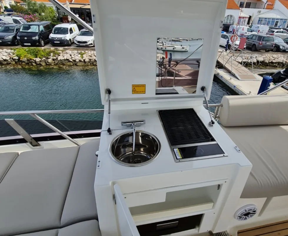 Deck of Ferus, a Jeanneau Prestige 460 Fly motor yacht at Grad Biograd na Moru, Croatia
