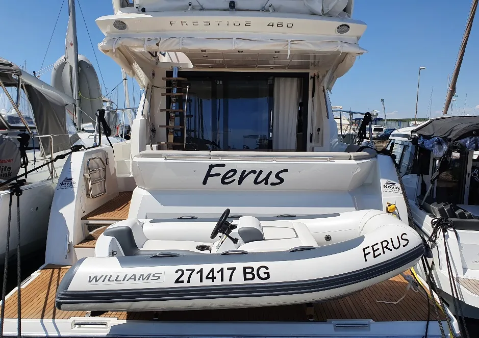 Exterior view of Ferus, a Jeanneau Prestige 460 Fly motor yacht at Grad Biograd na Moru, Croatia