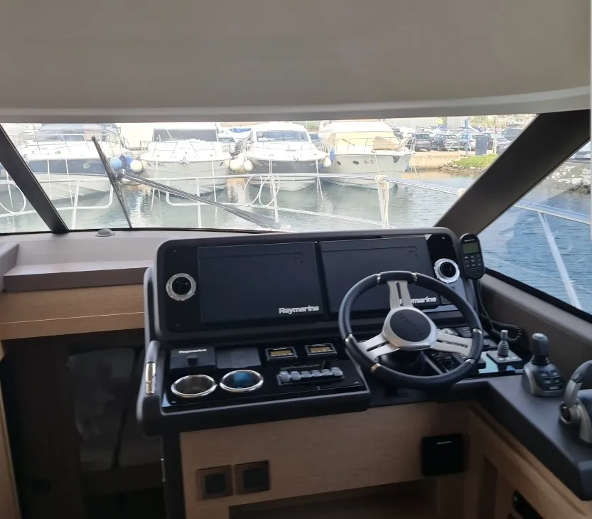Cockpit of Ferus, a Jeanneau Prestige 460 Fly motor yacht at Grad Biograd na Moru, Croatia