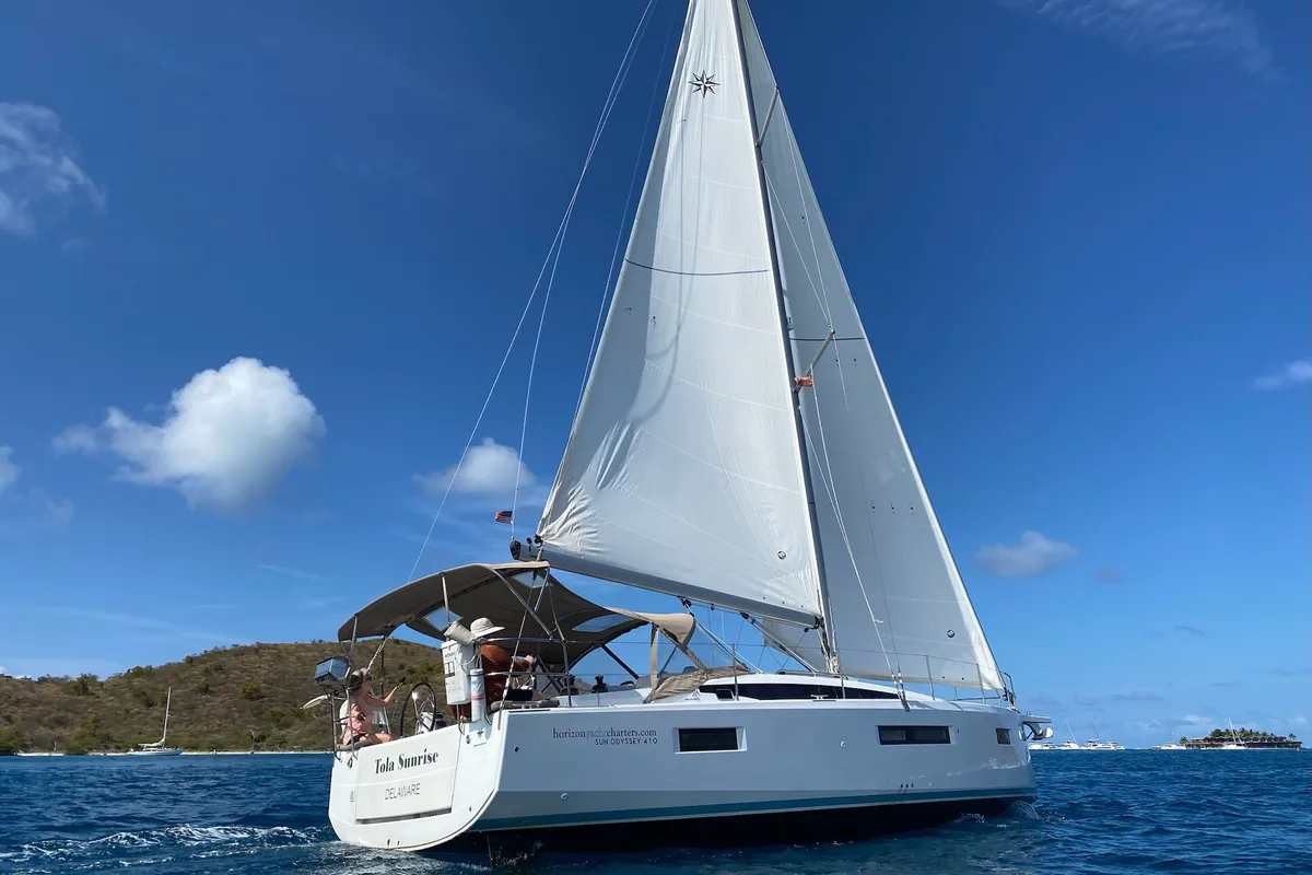 Exterior view of Tola Sunrise, a Jeanneau Sun Odyssey 410 sailboat at Road Town, British Virgin Islands
