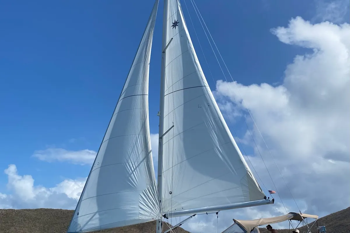 Exterior view of Tola Sunrise, a Jeanneau Sun Odyssey 410 sailboat at Road Town, British Virgin Islands
