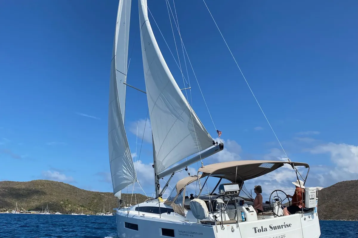Exterior view of Tola Sunrise, a Jeanneau Sun Odyssey 410 sailboat at Road Town, British Virgin Islands